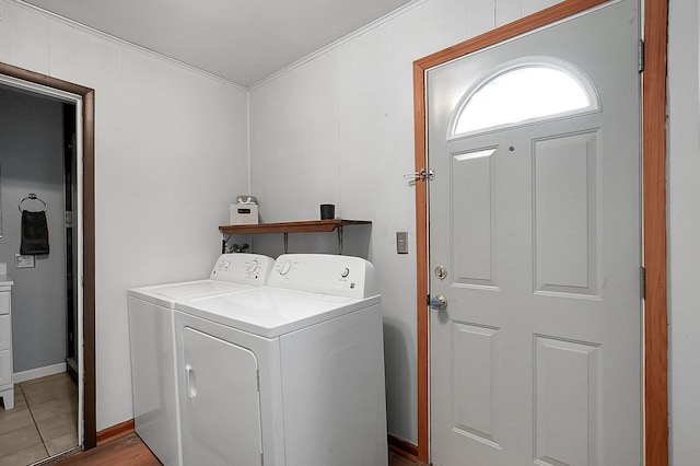 laundry room featuring washing machine and clothes dryer