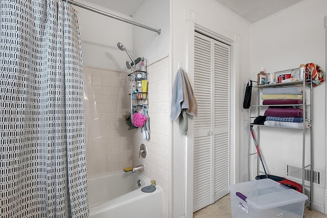 bathroom featuring shower / tub combo with curtain