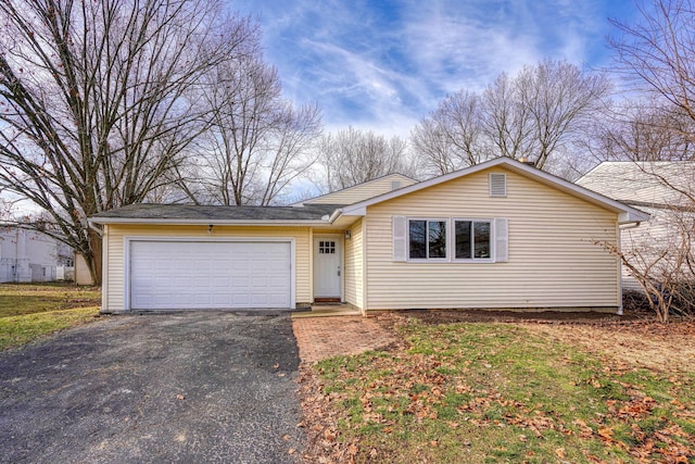 single story home with a garage