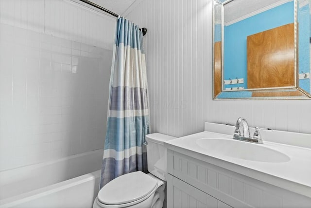 bathroom with a textured ceiling, vanity, shower / bath combination with curtain, and toilet