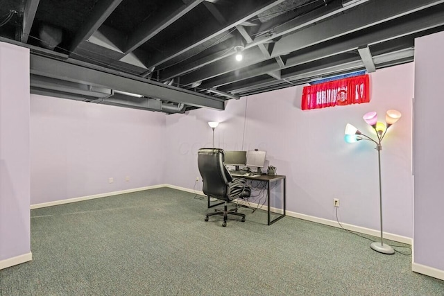 carpeted office space with baseboards