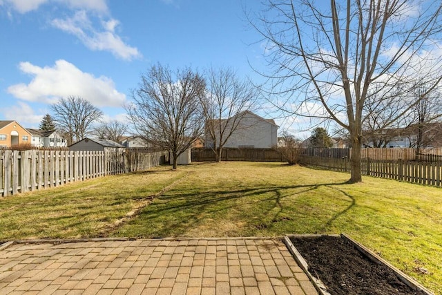 view of yard with a fenced backyard