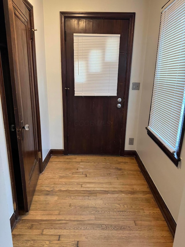 doorway to outside featuring light hardwood / wood-style floors