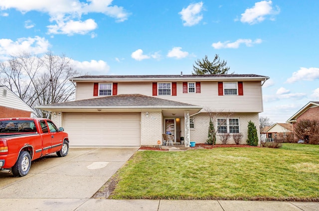 view of front of home with a garage and a front lawn