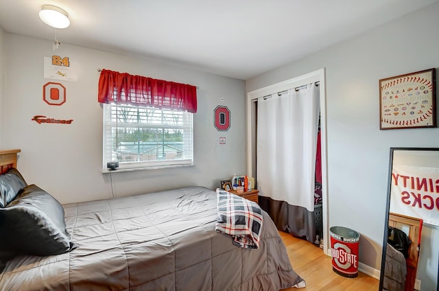 bedroom featuring hardwood / wood-style flooring