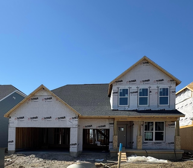 property in mid-construction featuring a garage