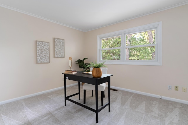 office space featuring light carpet and crown molding