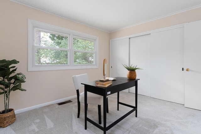 home office featuring crown molding and light colored carpet