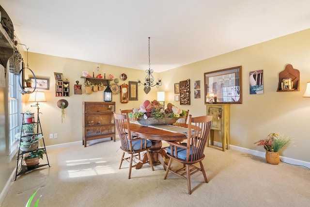 view of carpeted dining area
