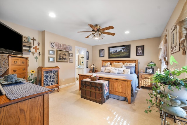 carpeted bedroom featuring connected bathroom
