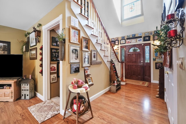 foyer with light hardwood / wood-style floors