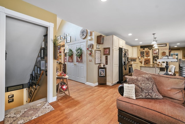 living room featuring light wood-type flooring