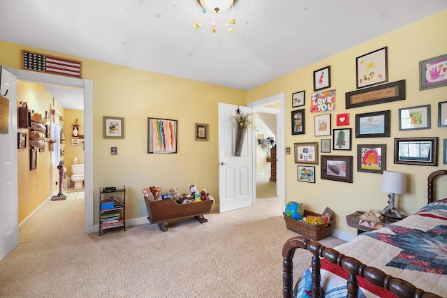 bedroom with light carpet