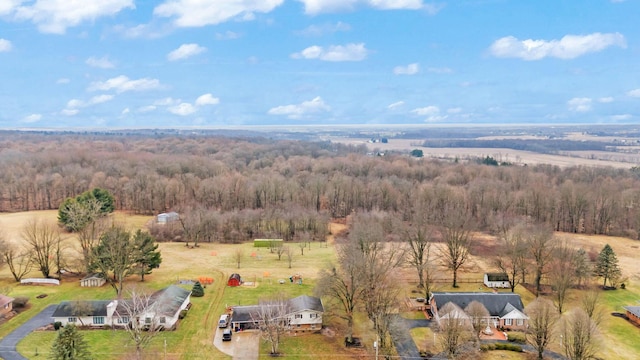 birds eye view of property with a rural view