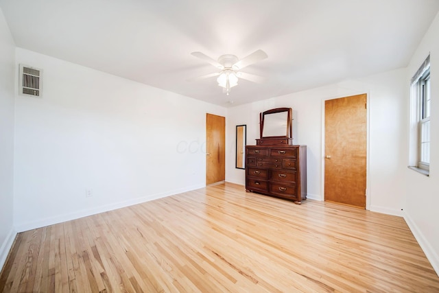 unfurnished bedroom featuring light hardwood / wood-style floors and ceiling fan