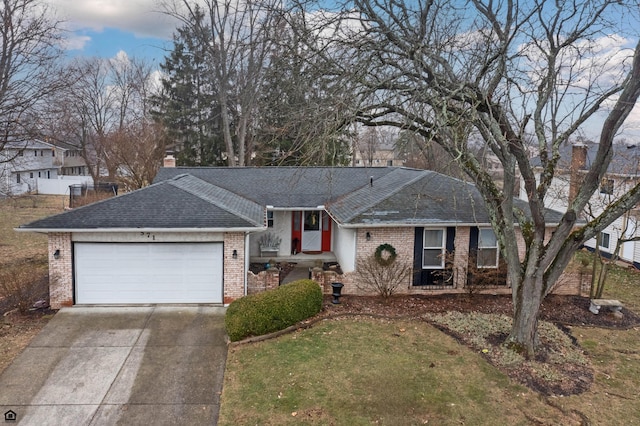 single story home with a garage and a front lawn