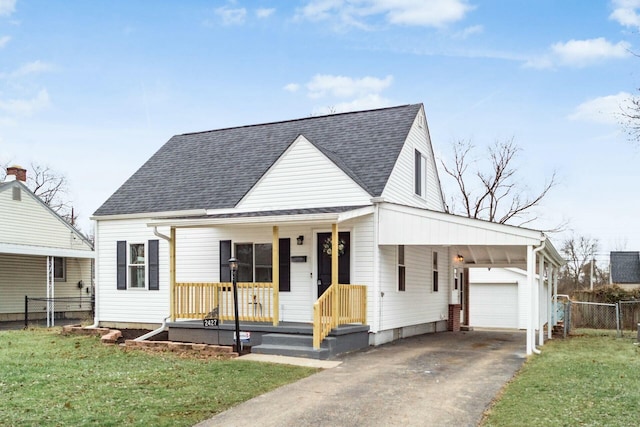 view of front of home featuring a garage, a front lawn, a carport, and covered porch