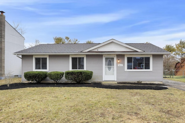 view of front of home with a front lawn