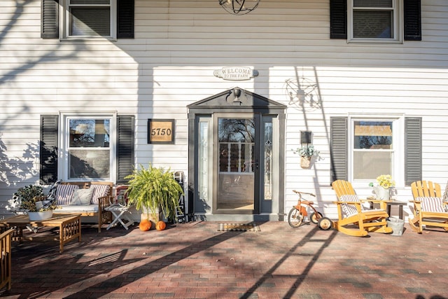 entrance to property with a patio area