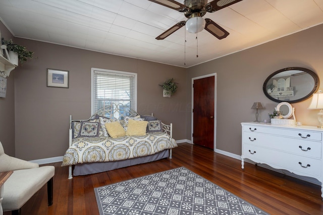 bedroom featuring hardwood / wood-style flooring and ceiling fan