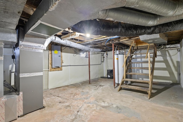 basement featuring heating unit, gas water heater, and electric panel