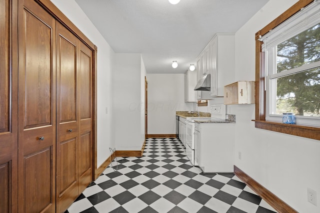 kitchen featuring white electric stove, sink, and white cabinets