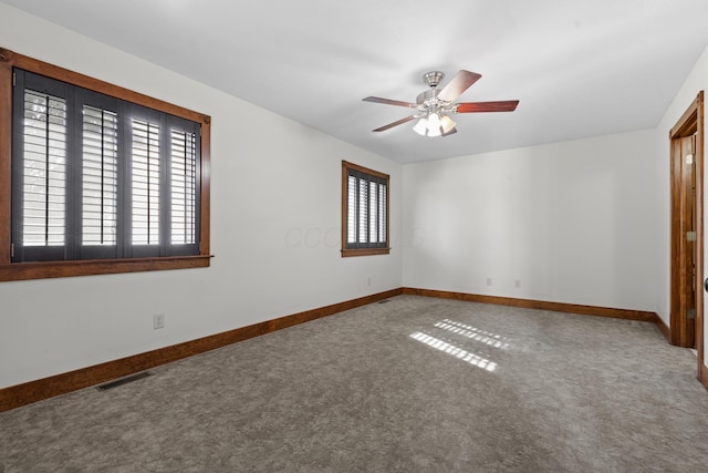 unfurnished bedroom featuring ceiling fan and carpet flooring