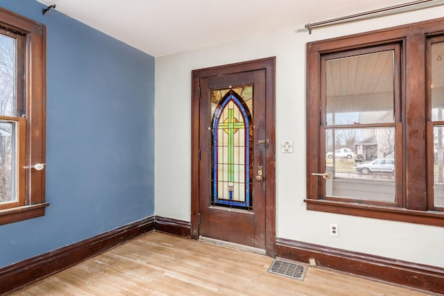 entryway with light wood-type flooring