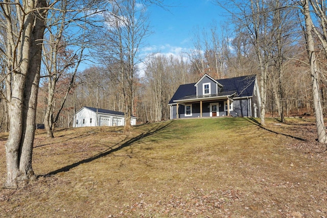 view of front of home with a porch and a front yard