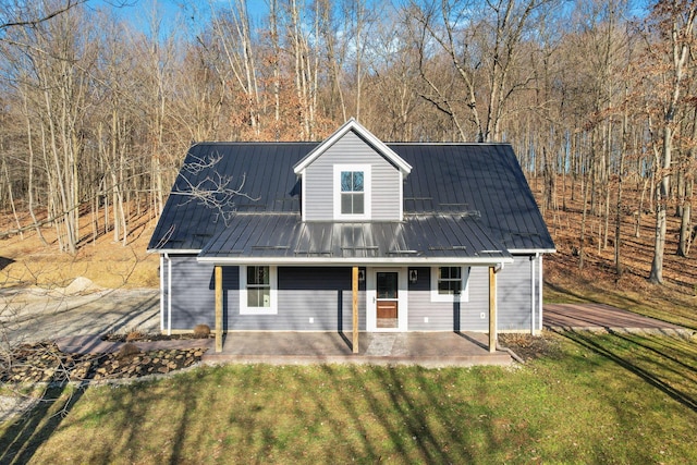 exterior space with a yard and covered porch