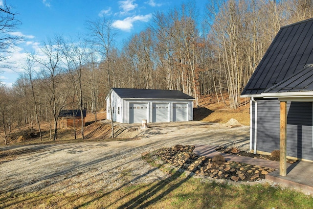 view of outbuilding with a garage