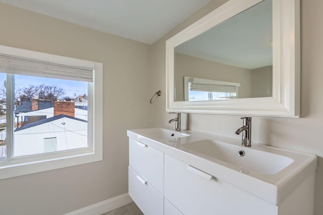 bathroom featuring vanity and a wealth of natural light