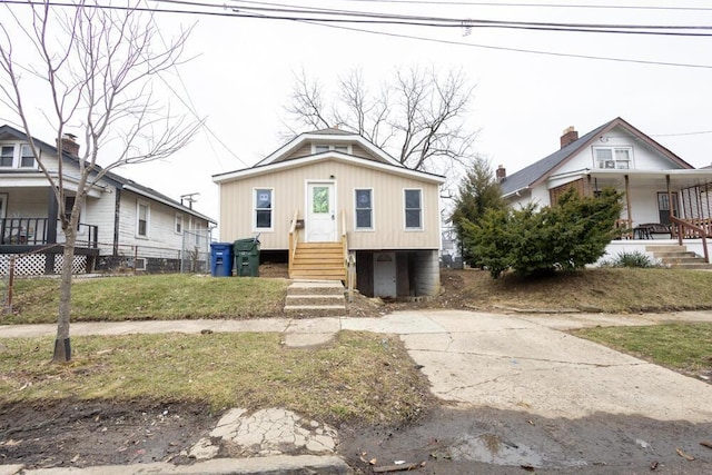 view of front of house with a front yard