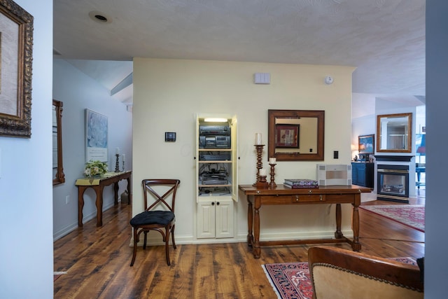 hallway featuring dark wood-type flooring