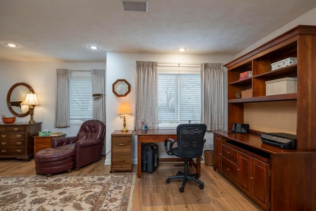 home office featuring light hardwood / wood-style floors