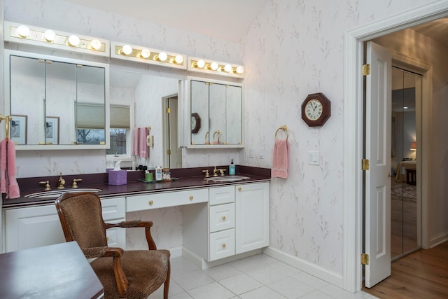 bathroom with vanity and tile patterned floors