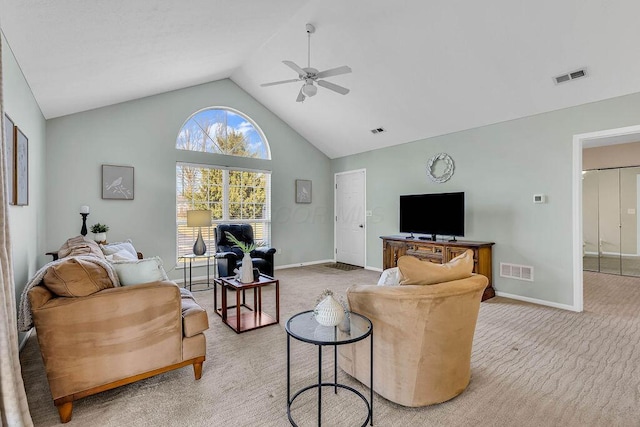 living area with visible vents, baseboards, light colored carpet, and ceiling fan