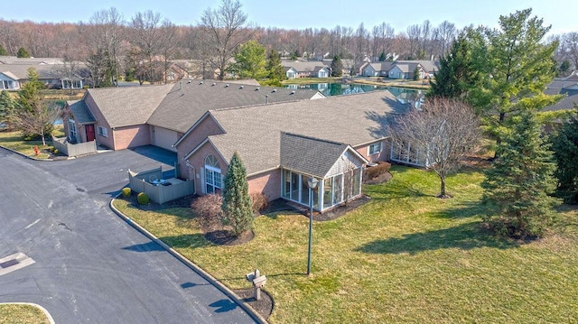 drone / aerial view with a residential view