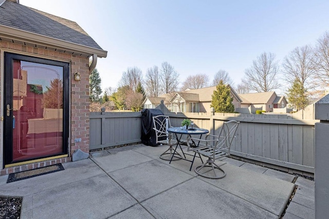 view of patio / terrace featuring a fenced backyard and outdoor dining space