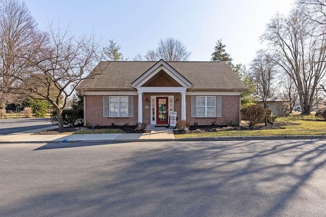 view of front facade featuring brick siding