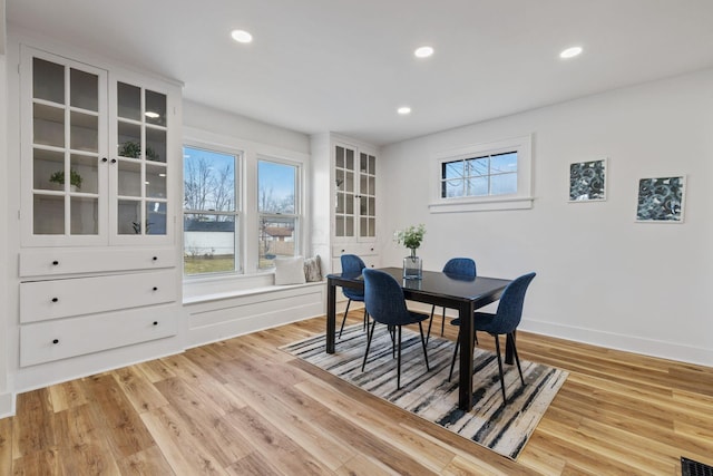 dining room with light wood-type flooring