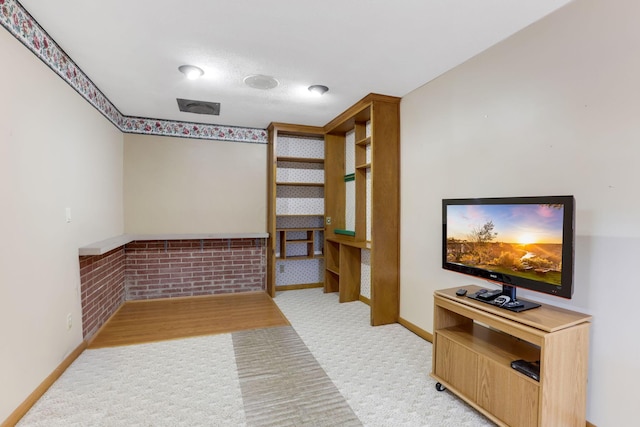 interior space featuring light colored carpet