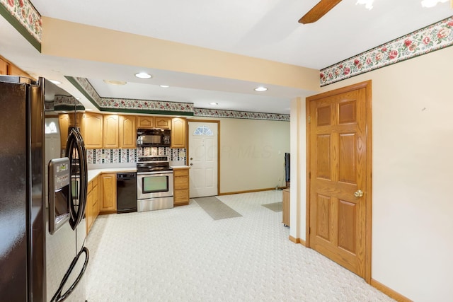 kitchen with backsplash, ceiling fan, and black appliances