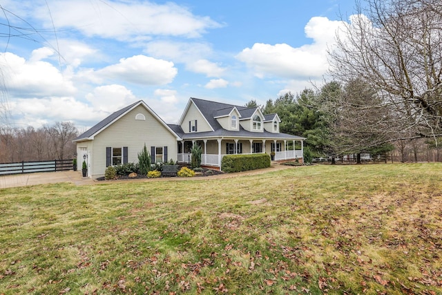 view of front of house featuring a front yard and a porch