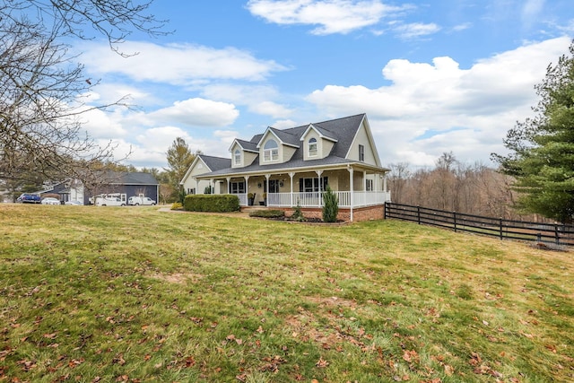 view of front of property featuring a front lawn and covered porch