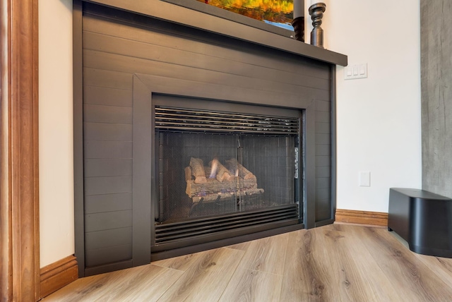 interior details featuring hardwood / wood-style floors