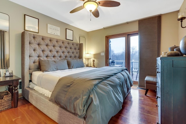 bedroom with access to exterior, dark wood-type flooring, and ceiling fan