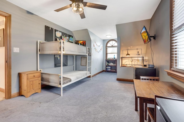 bedroom with light colored carpet