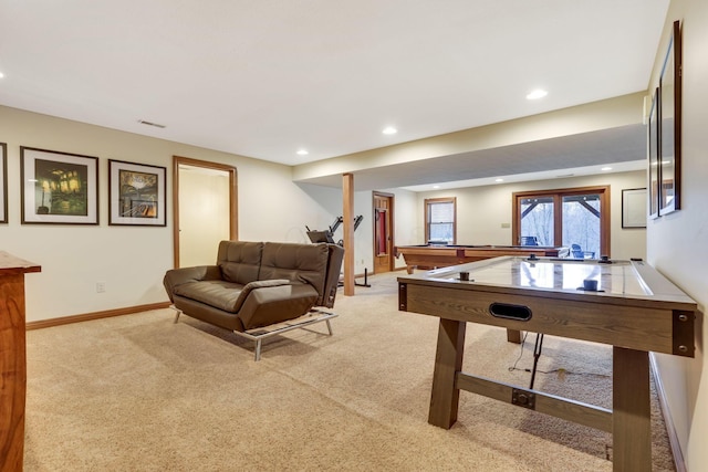 recreation room featuring light colored carpet