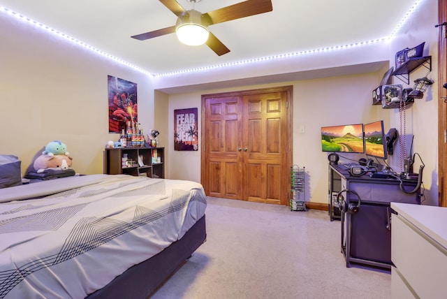 carpeted bedroom featuring ceiling fan